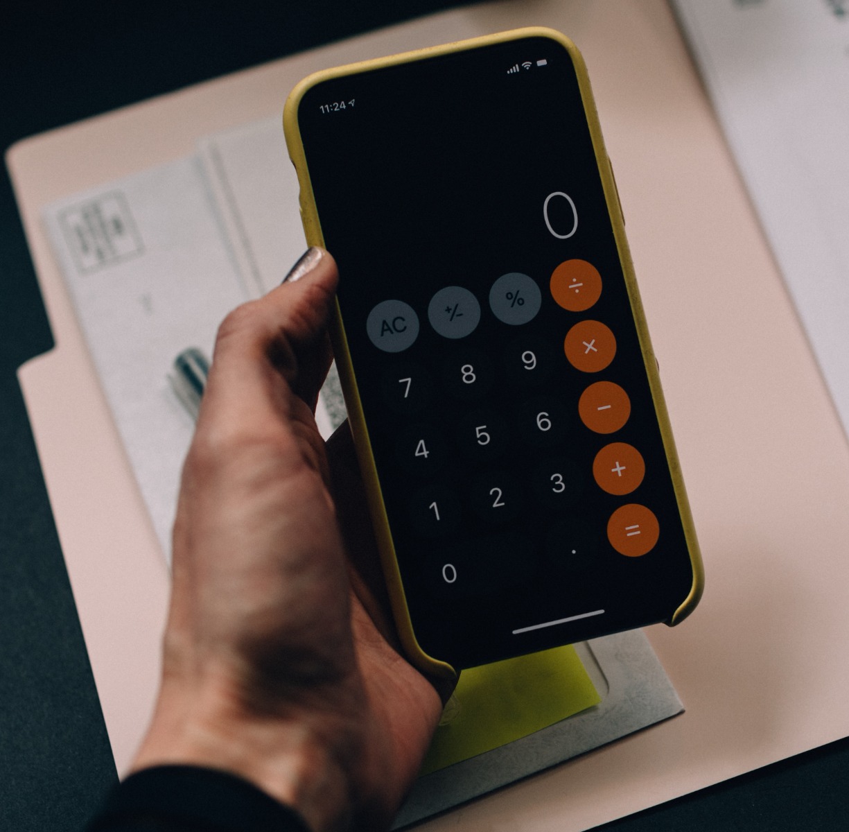 hand holding calculator