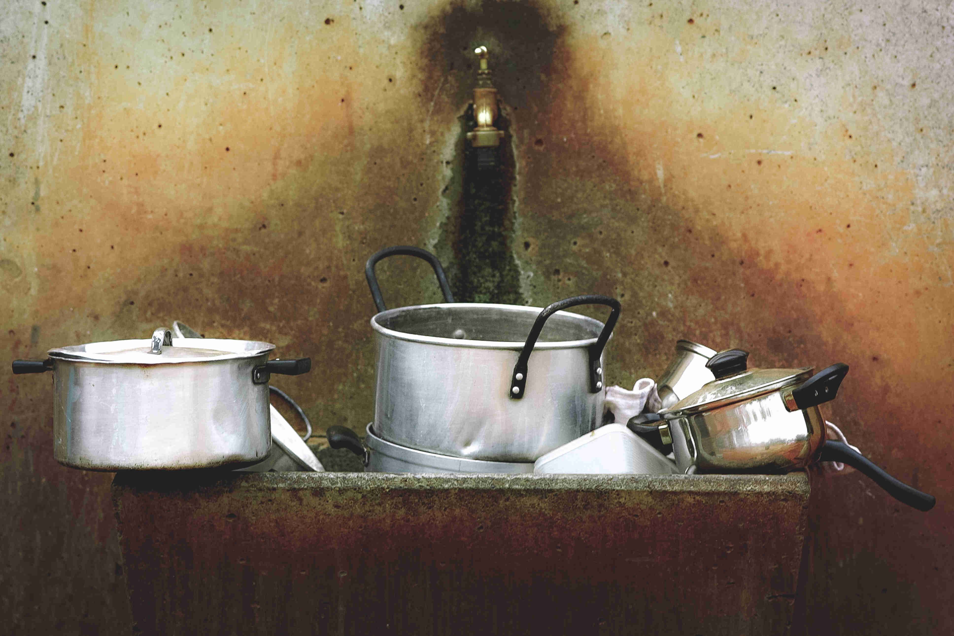 dirty pots and pans - image by Scott Umstattd