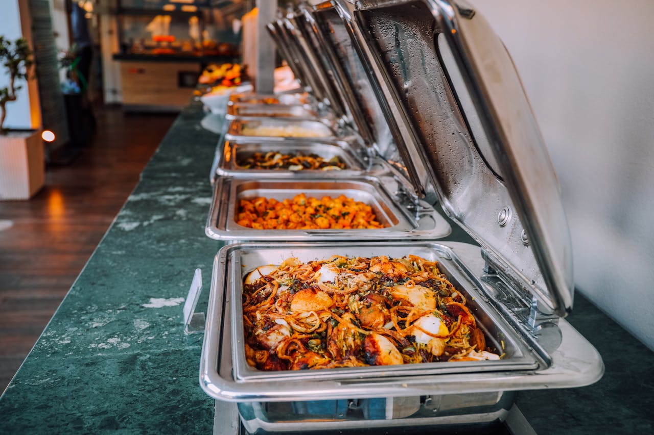 buffet food in chafing dishes