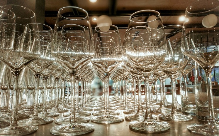rows of clean wine glasses