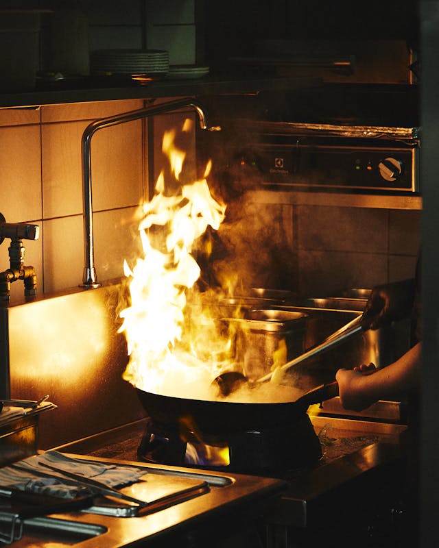 cooking wok with fire